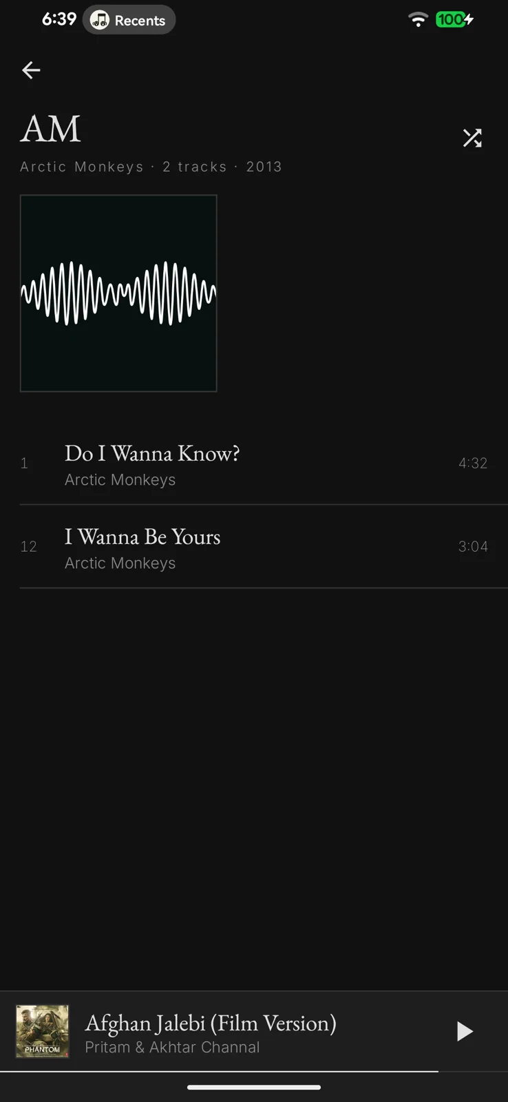 An album's track listing with its cover at the top