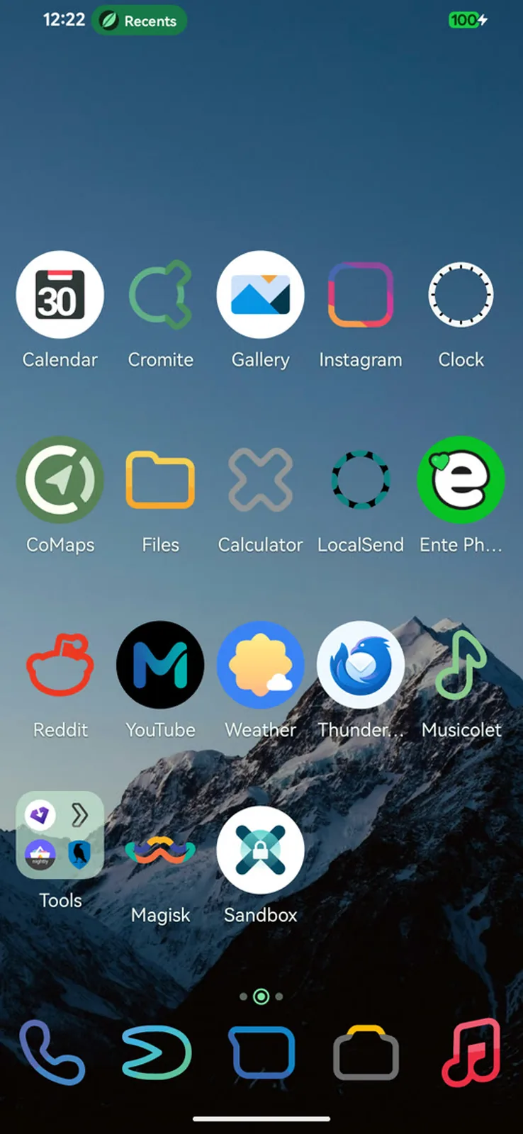 Eden's home screen with a dock, page dots and a themed icon grid